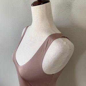 Beautiful, soft, sexy nude/cream colored Inc body suit. Size Large NWT